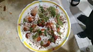 Tasty Dahi Bhalla cooked by COOX chefs cooks during occasions parties events at home