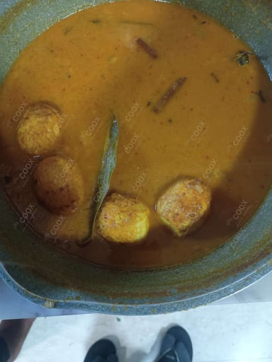 Tasty Egg Curry cooked by COOX chefs cooks during occasions parties events at home