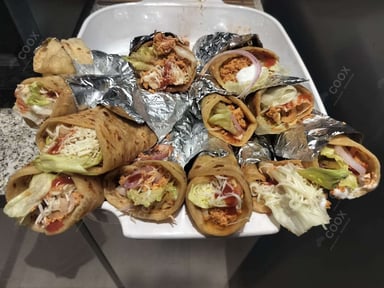 Tasty Chicken Shawarma cooked by COOX chefs cooks during occasions parties events at home