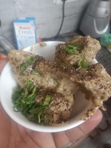 Tasty Murgh Kali Mirch cooked by COOX chefs cooks during occasions parties events at home