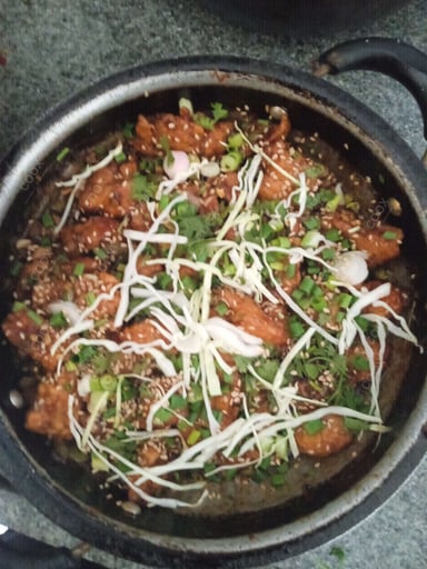 Tasty Chicken Manchurian (Dry) cooked by COOX chefs cooks during occasions parties events at home