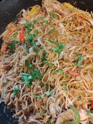 Tasty Chicken Hakka Noodles cooked by COOX chefs cooks during occasions parties events at home