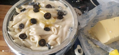 Tasty Pasta in White Sauce cooked by COOX chefs cooks during occasions parties events at home