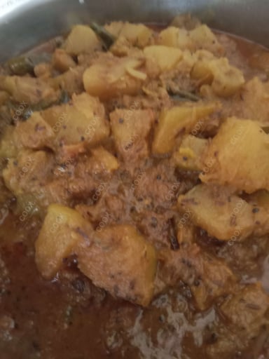 Tasty Kaddu ki Sabzi (Sitafal) cooked by COOX chefs cooks during occasions parties events at home