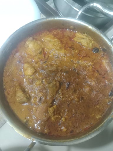 Tasty Chicken Curry cooked by COOX chefs cooks during occasions parties events at home