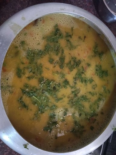 Tasty Masoor Dal  cooked by COOX chefs cooks during occasions parties events at home
