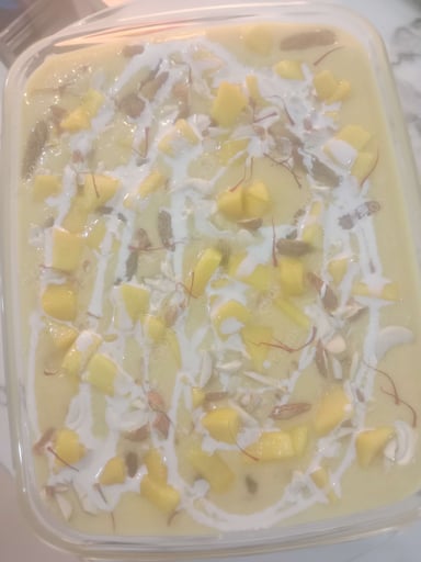 Tasty Mango Kheer cooked by COOX chefs cooks during occasions parties events at home