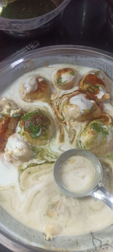 Tasty Dahi Bhalla cooked by COOX chefs cooks during occasions parties events at home
