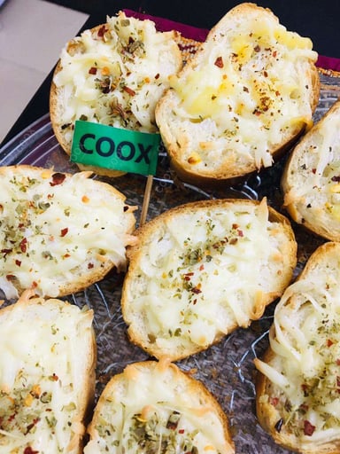 Tasty Garlic Bread with Cheese cooked by COOX chefs cooks during occasions parties events at home
