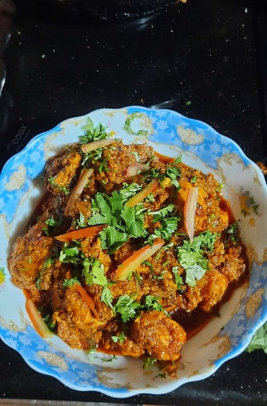Tasty Chicken Tikka Masala cooked by COOX chefs cooks during occasions parties events at home