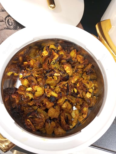 Tasty Karele ki Sabzi cooked by COOX chefs cooks during occasions parties events at home