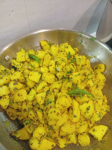 Tasty Jeera Aloo cooked by COOX chefs cooks during occasions parties events at home