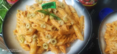 Tasty Pasta in Pink Sauce cooked by COOX chefs cooks during occasions parties events at home
