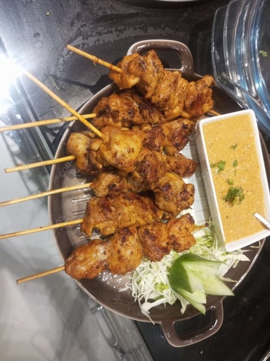 Tasty Thai Chicken Satay cooked by COOX chefs cooks during occasions parties events at home