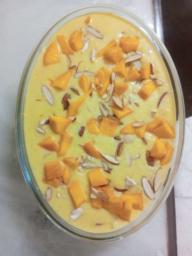 Tasty Mango Kheer cooked by COOX chefs cooks during occasions parties events at home