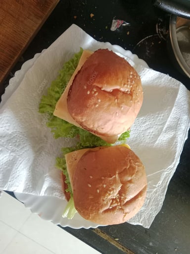 Tasty Paneer Tikka Burger cooked by COOX chefs cooks during occasions parties events at home