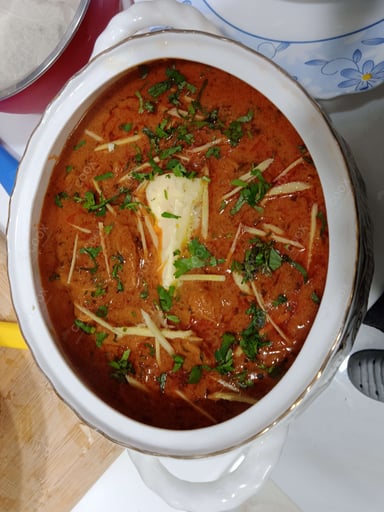 Tasty Soya Chaap (Gravy) cooked by COOX chefs cooks during occasions parties events at home