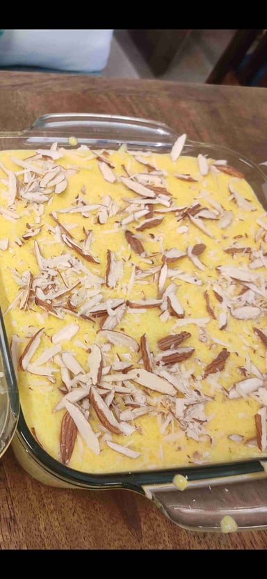 Tasty Mango Phirni cooked by COOX chefs cooks during occasions parties events at home