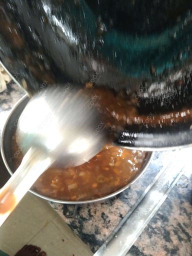 Tasty Vegetable Manchow Soup cooked by COOX chefs cooks during occasions parties events at home