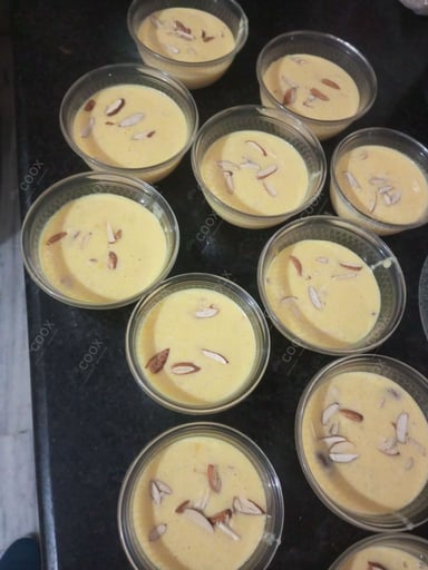 Tasty Mango Phirni cooked by COOX chefs cooks during occasions parties events at home
