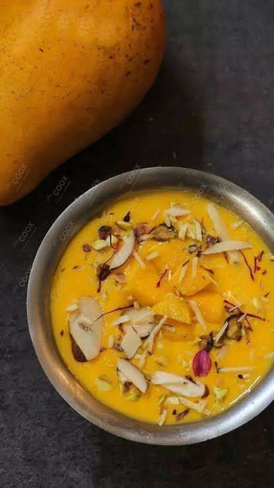 Tasty Mango Kheer cooked by COOX chefs cooks during occasions parties events at home
