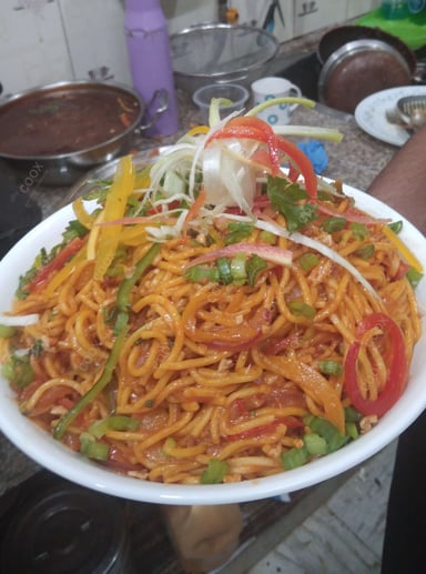 Tasty Veg Hakka Noodles cooked by COOX chefs cooks during occasions parties events at home