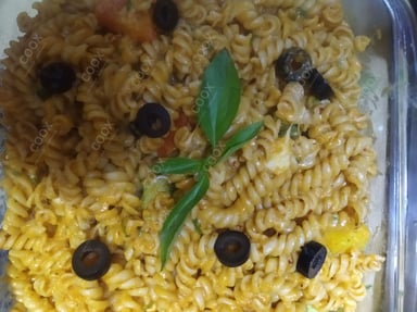 Tasty Pasta in White Sauce cooked by COOX chefs cooks during occasions parties events at home