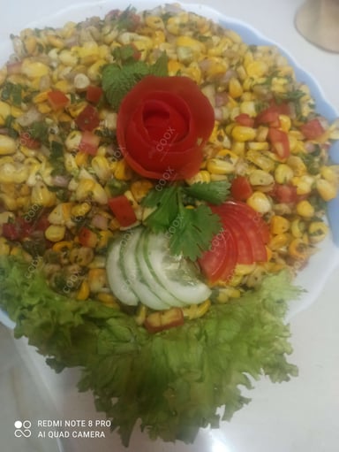 Tasty Corn Chaat cooked by COOX chefs cooks during occasions parties events at home