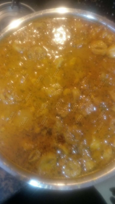 Tasty Soya Chaap (Gravy) cooked by COOX chefs cooks during occasions parties events at home