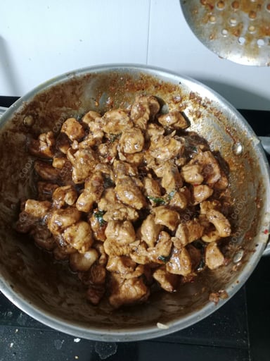 Tasty Thai Basil Chicken cooked by COOX chefs cooks during occasions parties events at home