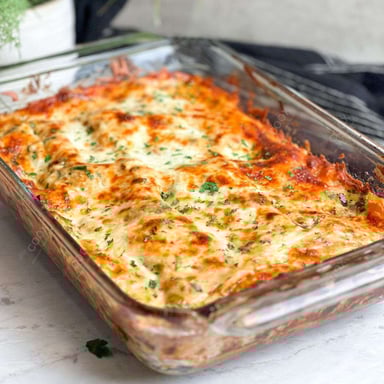 Tasty Chicken Lasagna cooked by COOX chefs cooks during occasions parties events at home
