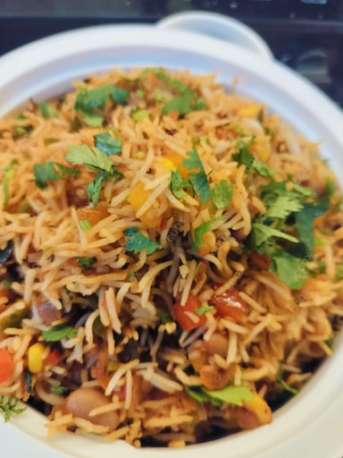 Tasty Mexican Rice cooked by COOX chefs cooks during occasions parties events at home