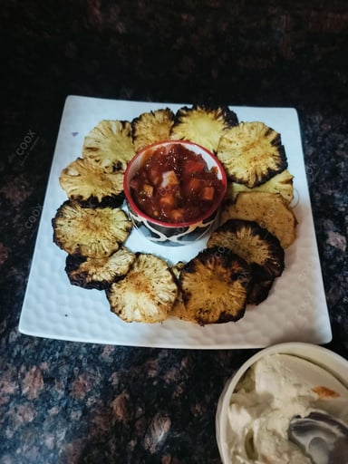 Tasty Pan Fried Pineapple cooked by COOX chefs cooks during occasions parties events at home