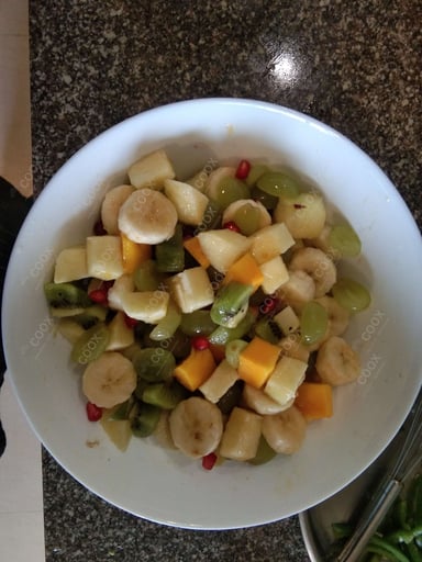 Tasty Fruit Chaat cooked by COOX chefs cooks during occasions parties events at home