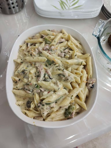 Tasty Chicken Pasta in White Sauce cooked by COOX chefs cooks during occasions parties events at home