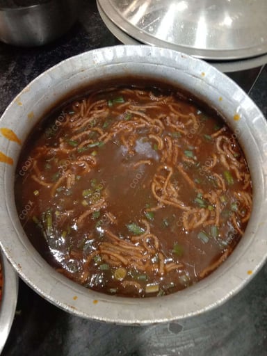 Tasty Chicken Manchow Soup cooked by COOX chefs cooks during occasions parties events at home