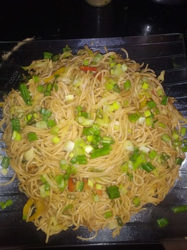 Tasty Chilli Garlic Noodles cooked by COOX chefs cooks during occasions parties events at home