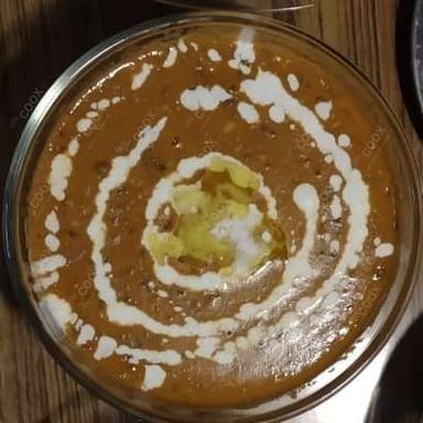 Tasty Dal Makhni cooked by COOX chefs cooks during occasions parties events at home