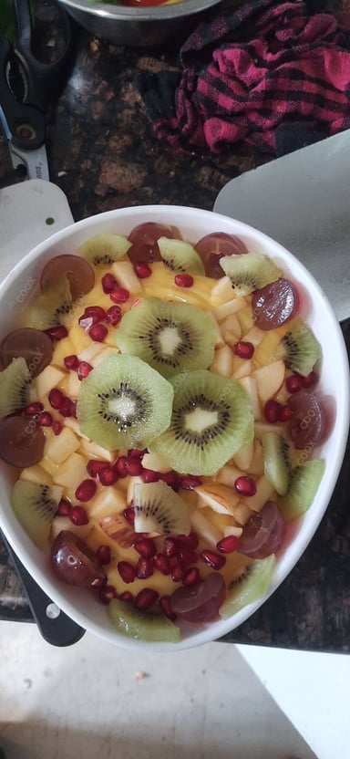 Tasty Fruit Custard cooked by COOX chefs cooks during occasions parties events at home