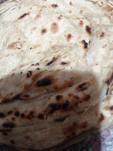 Tasty Lachha Paranthas cooked by COOX chefs cooks during occasions parties events at home