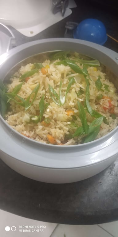 Tasty Veg Fried Rice cooked by COOX chefs cooks during occasions parties events at home