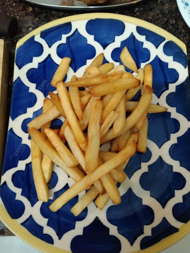 Tasty French Fries cooked by COOX chefs cooks during occasions parties events at home
