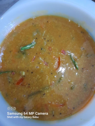 Tasty Sambhar cooked by COOX chefs cooks during occasions parties events at home