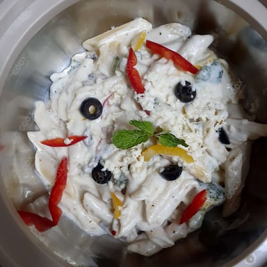 Tasty Pasta in White Sauce cooked by COOX chefs cooks during occasions parties events at home