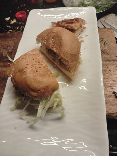 Tasty Chicken Tikka Burgers cooked by COOX chefs cooks during occasions parties events at home