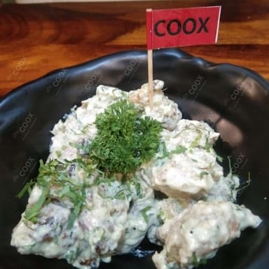 Tasty Murgh Malai Tikka cooked by COOX chefs cooks during occasions parties events at home