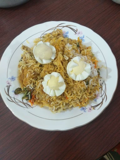 Tasty Chicken Biryani cooked by COOX chefs cooks during occasions parties events at home