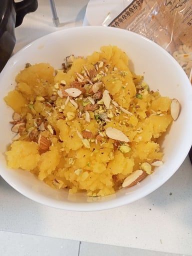 Tasty Moong Dal Halwa cooked by COOX chefs cooks during occasions parties events at home