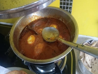Tasty Egg Curry cooked by COOX chefs cooks during occasions parties events at home