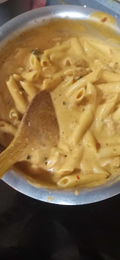 Tasty Chicken Pasta in Mix Sauce cooked by COOX chefs cooks during occasions parties events at home